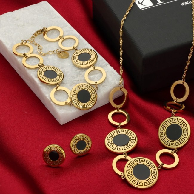 Złoty komplet bransoletka i naszyjnik z czarnymi medalionami