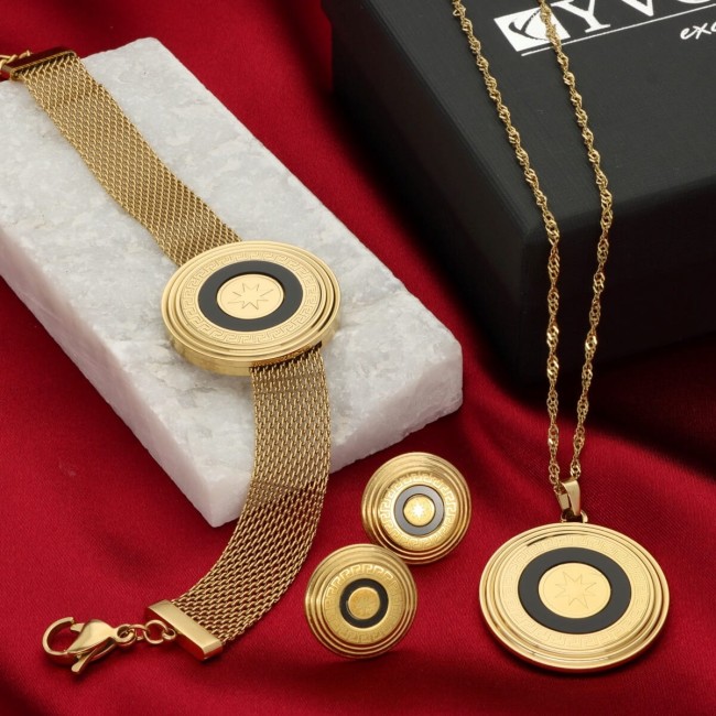 Złoty komplet bransoletka i naszyjnik z czarnym medalionem i gwiazdą